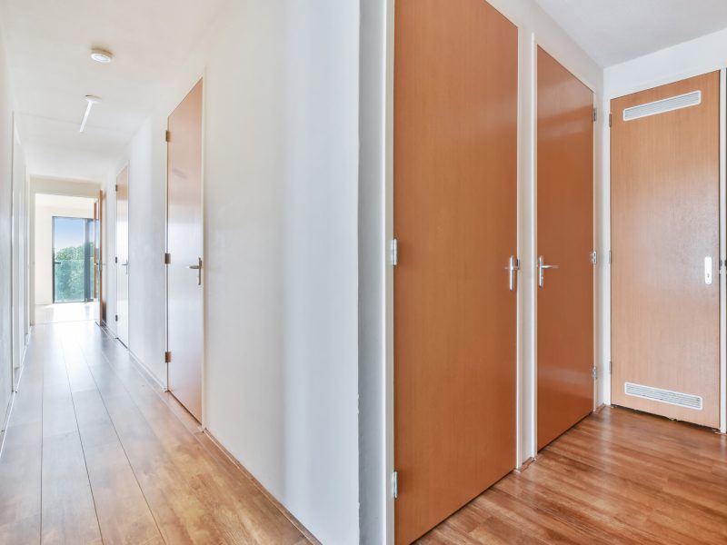 A long empty corridor designed in minimalistic style