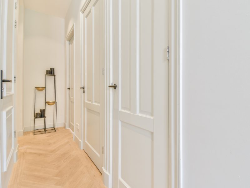 A long empty corridor designed in minimalistic style